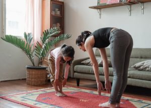 home physiotherapy kid exercising at home